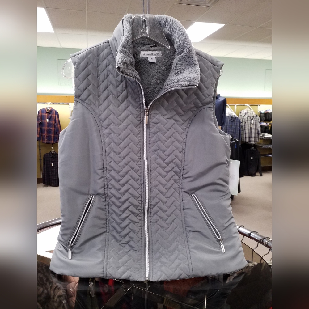 Quilted vest with sherpa lining.